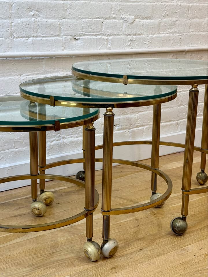 Antique Three Piece Brass and Glass Nesting Side Tables on Castor Wheels