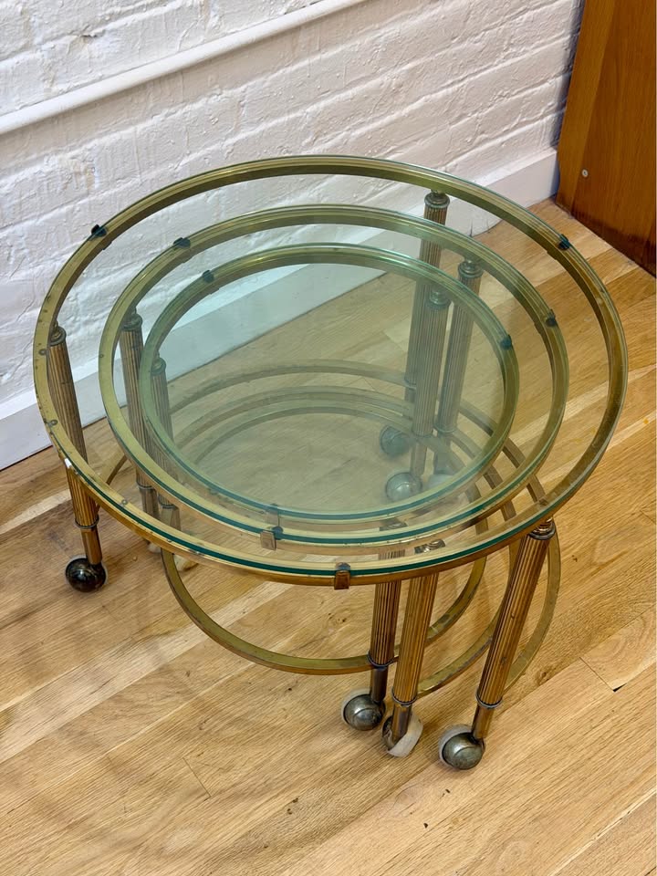Antique Three Piece Brass and Glass Nesting Side Tables on Castor Wheels
