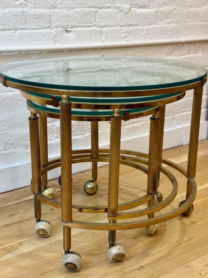Antique Three Piece Brass and Glass Nesting Side Tables on Castor Wheels