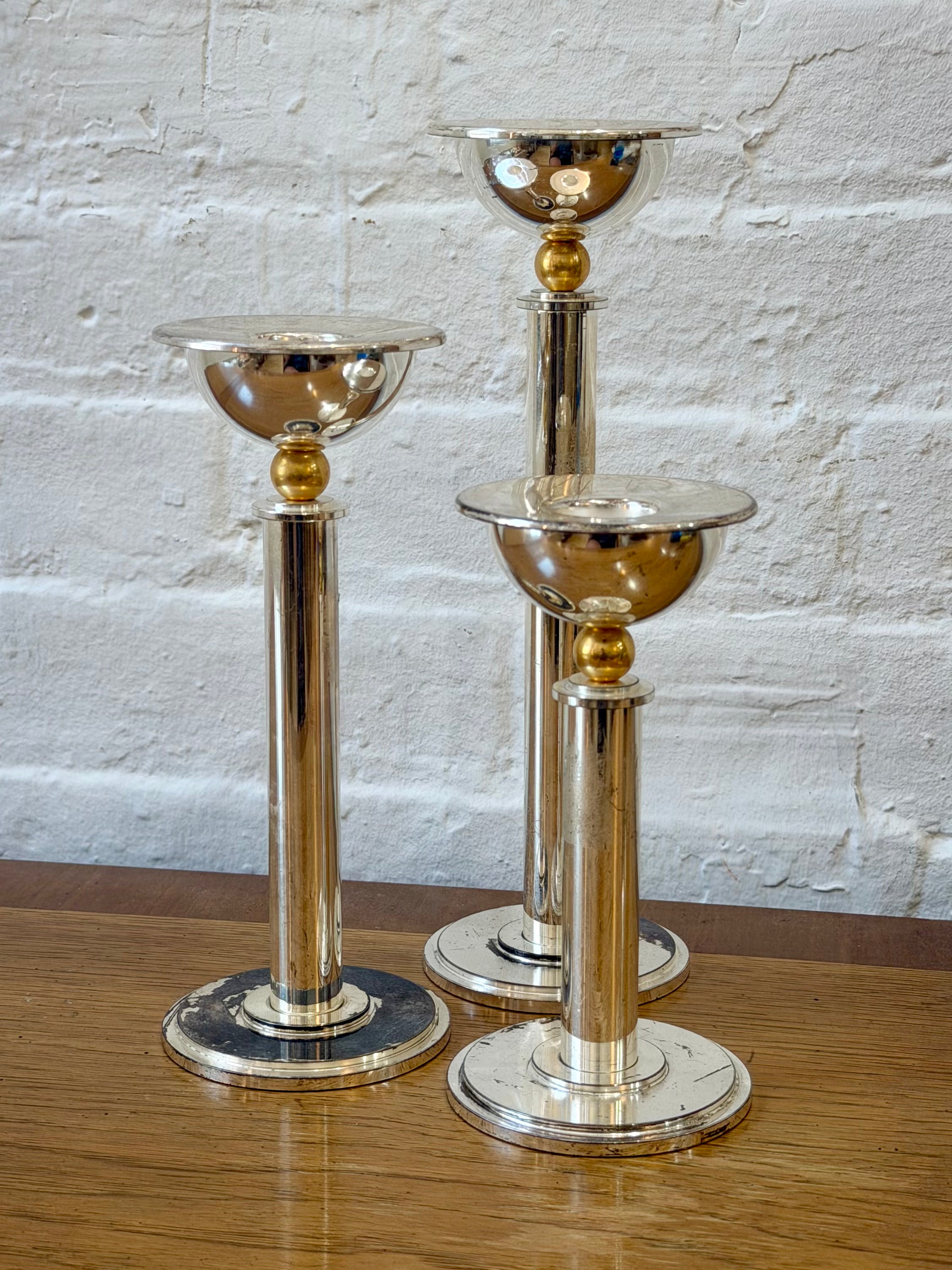 Trio of Silver Candlesticks with Brass Accent