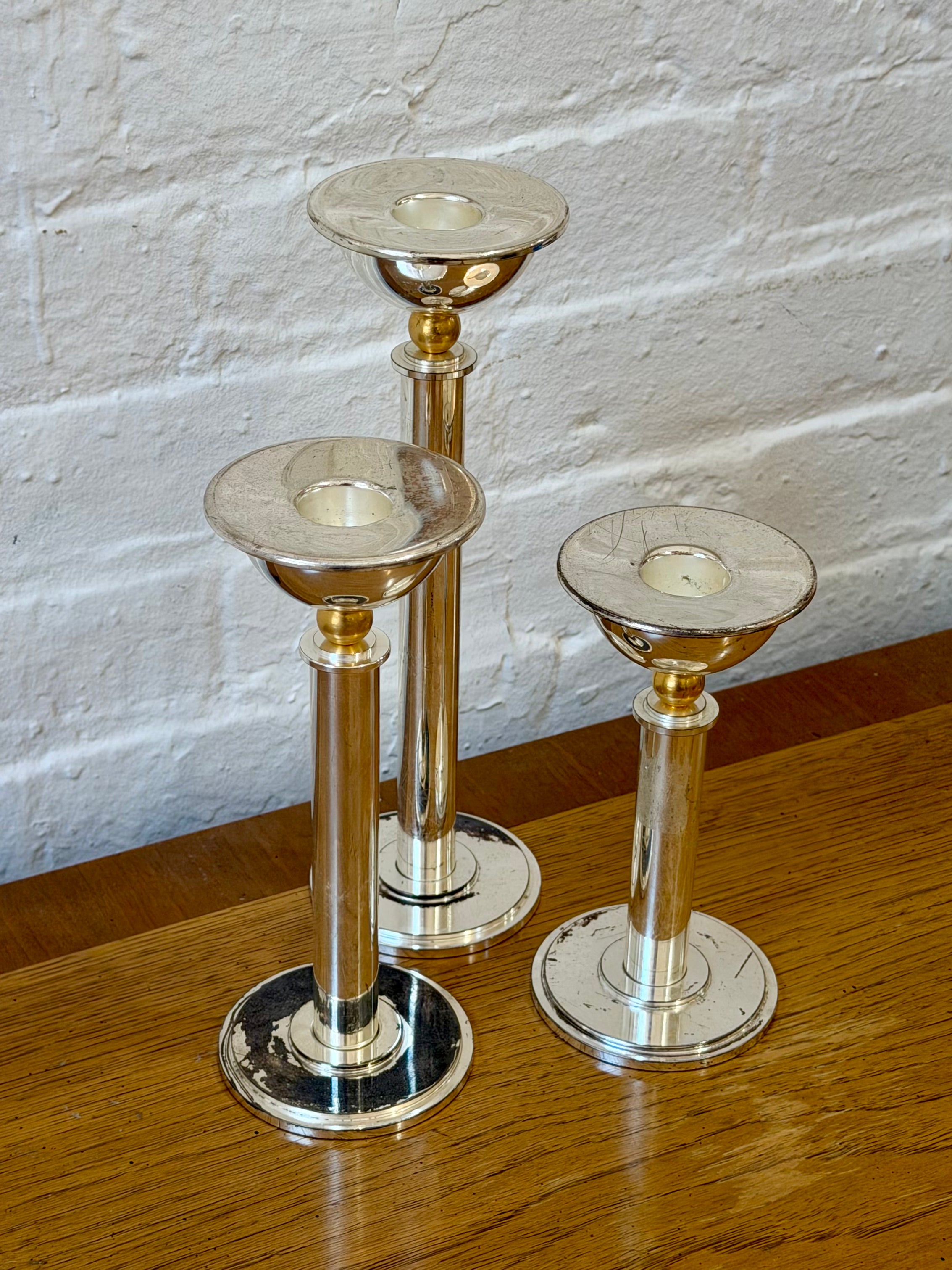 Trio of Silver Candlesticks with Brass Accent