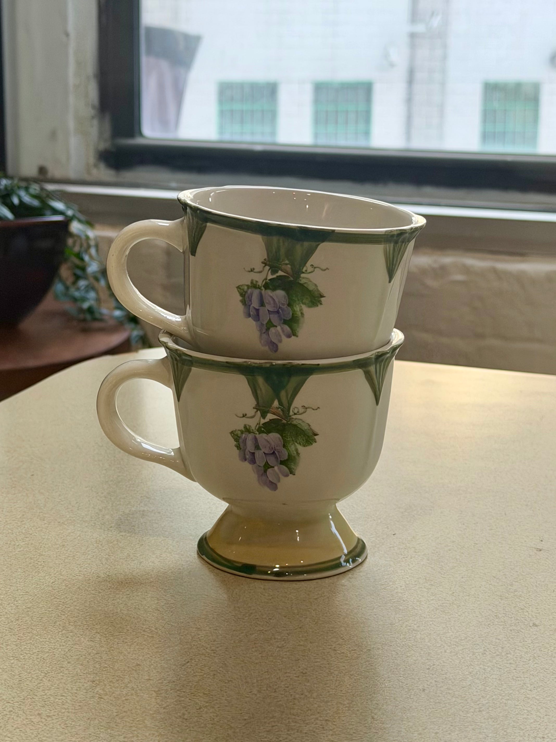 Pair of Gibson Designs Tuscany Footed Grape Pattern Mugs