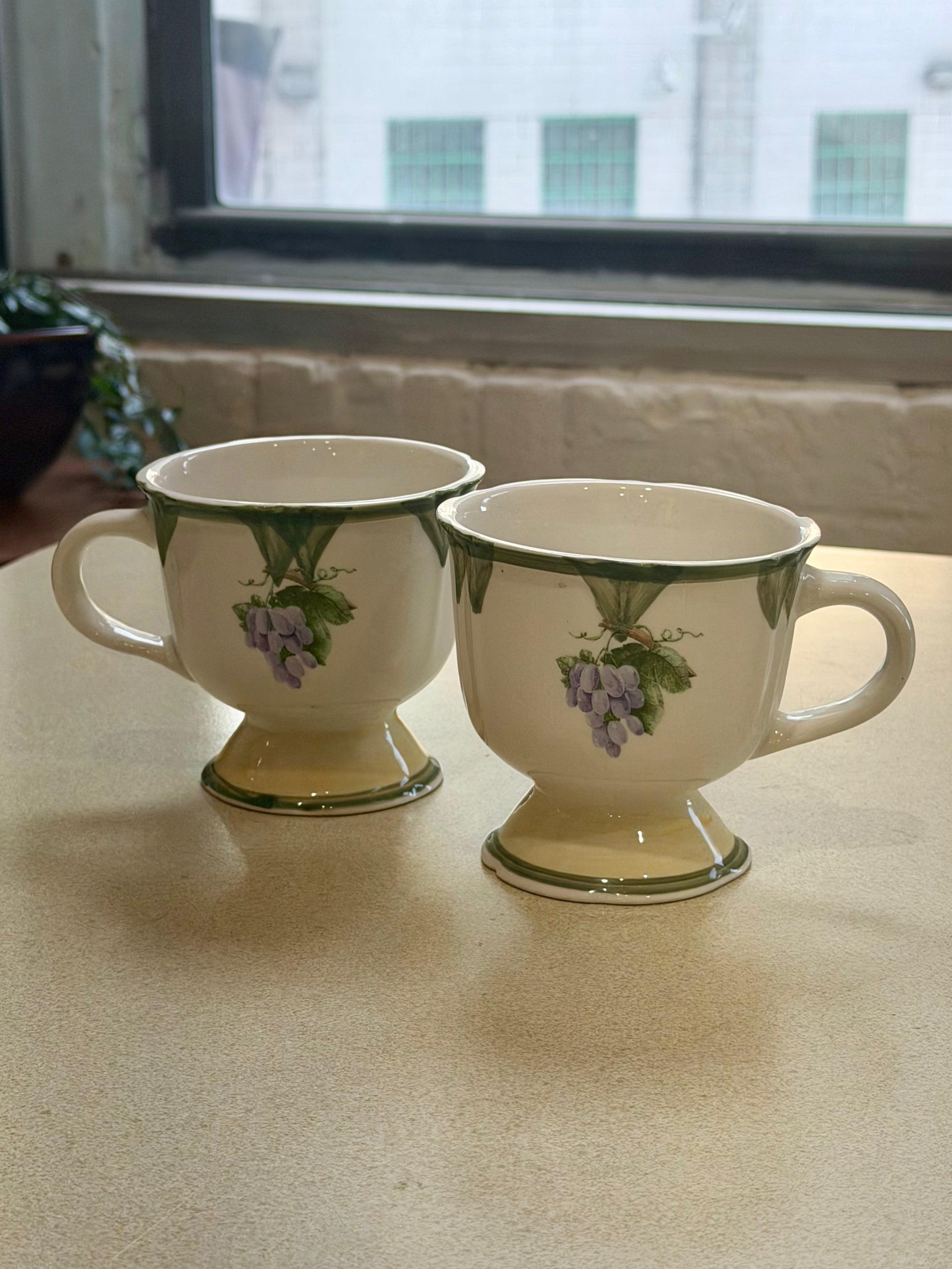 Pair of Gibson Designs Tuscany Footed Grape Pattern Mugs