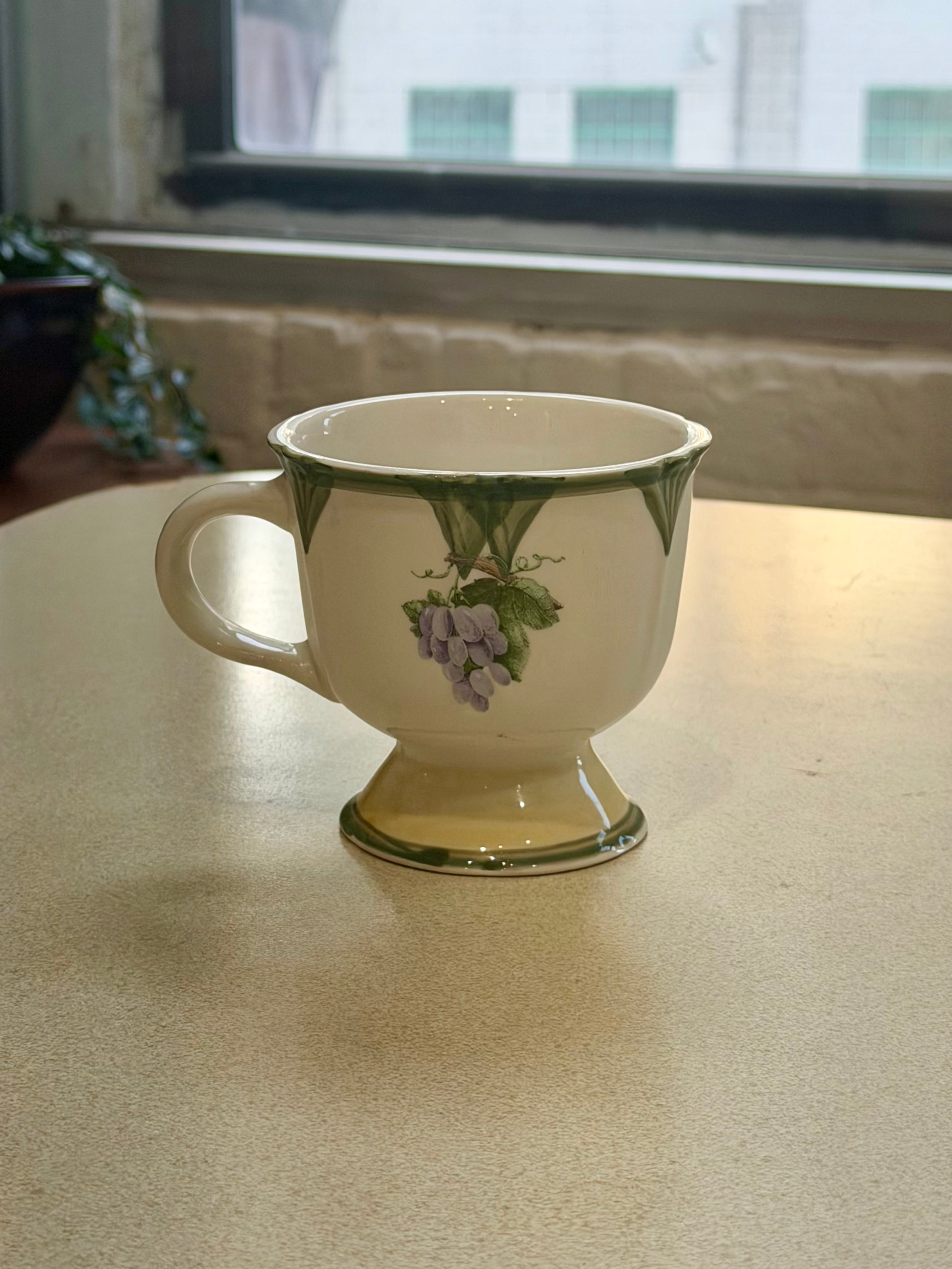 Pair of Gibson Designs Tuscany Footed Grape Pattern Mugs