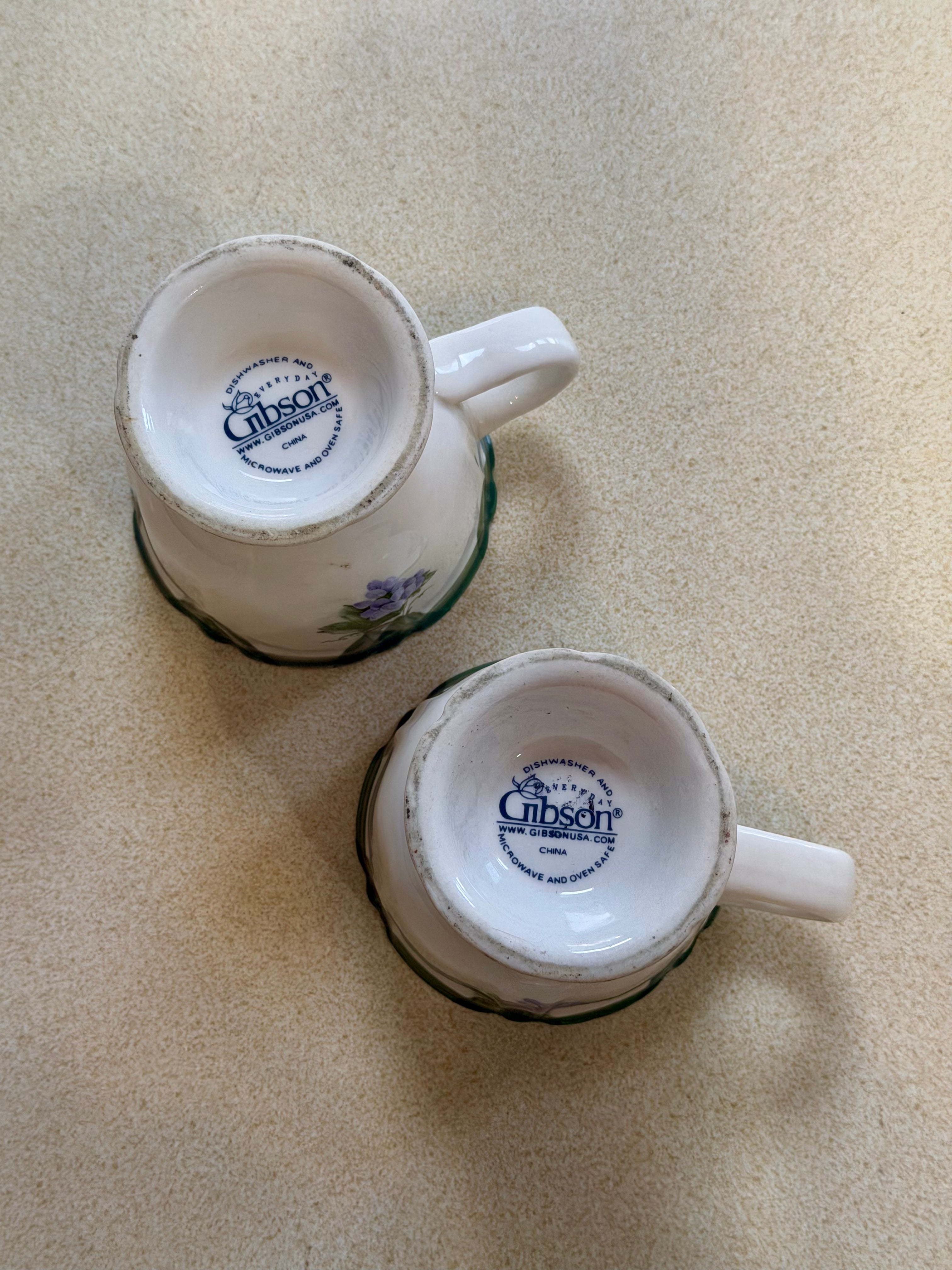 Pair of Gibson Designs Tuscany Footed Grape Pattern Mugs