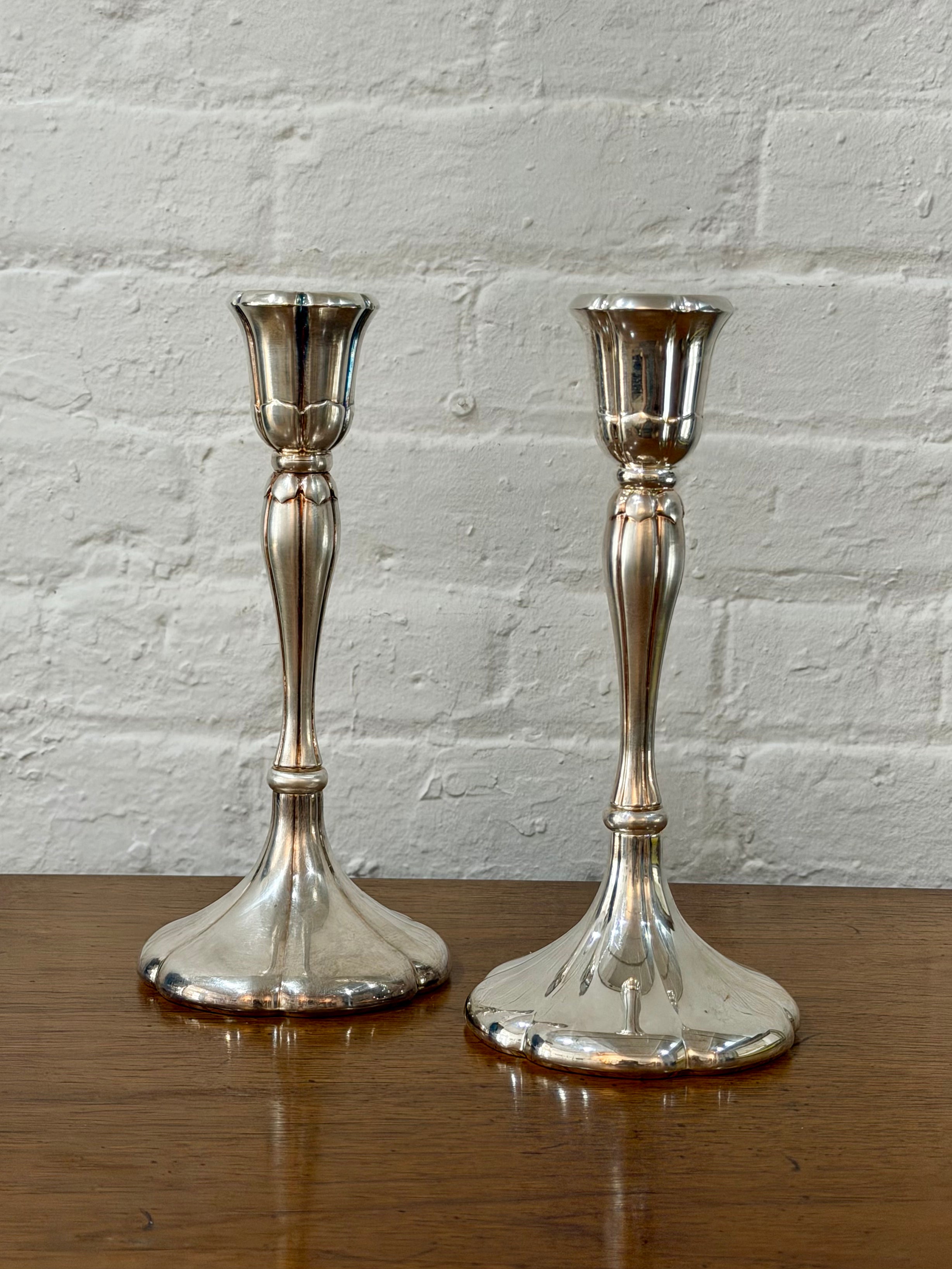 Pair of Weighted Silver Candlestick Holders