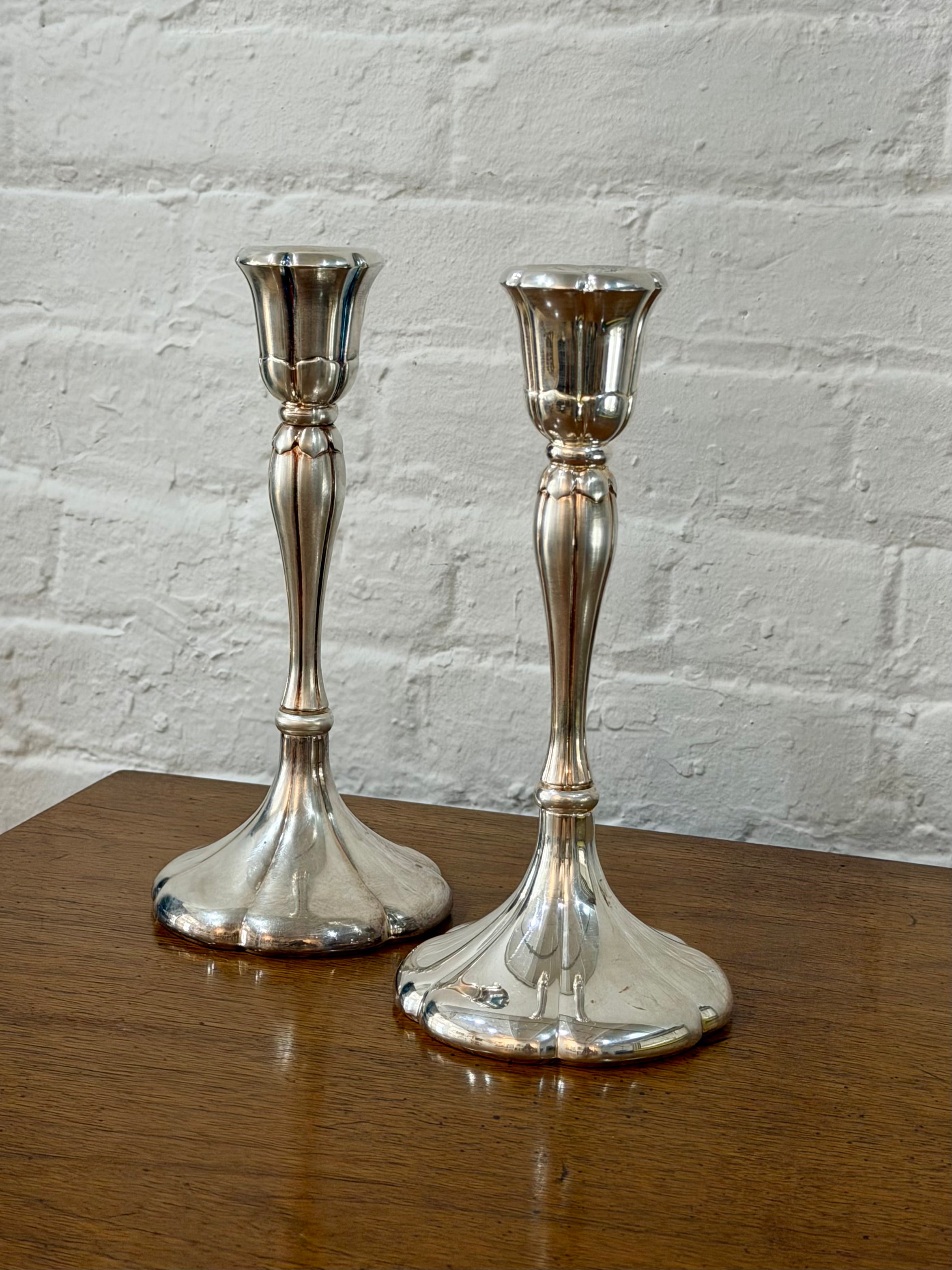 Pair of Weighted Silver Candlestick Holders