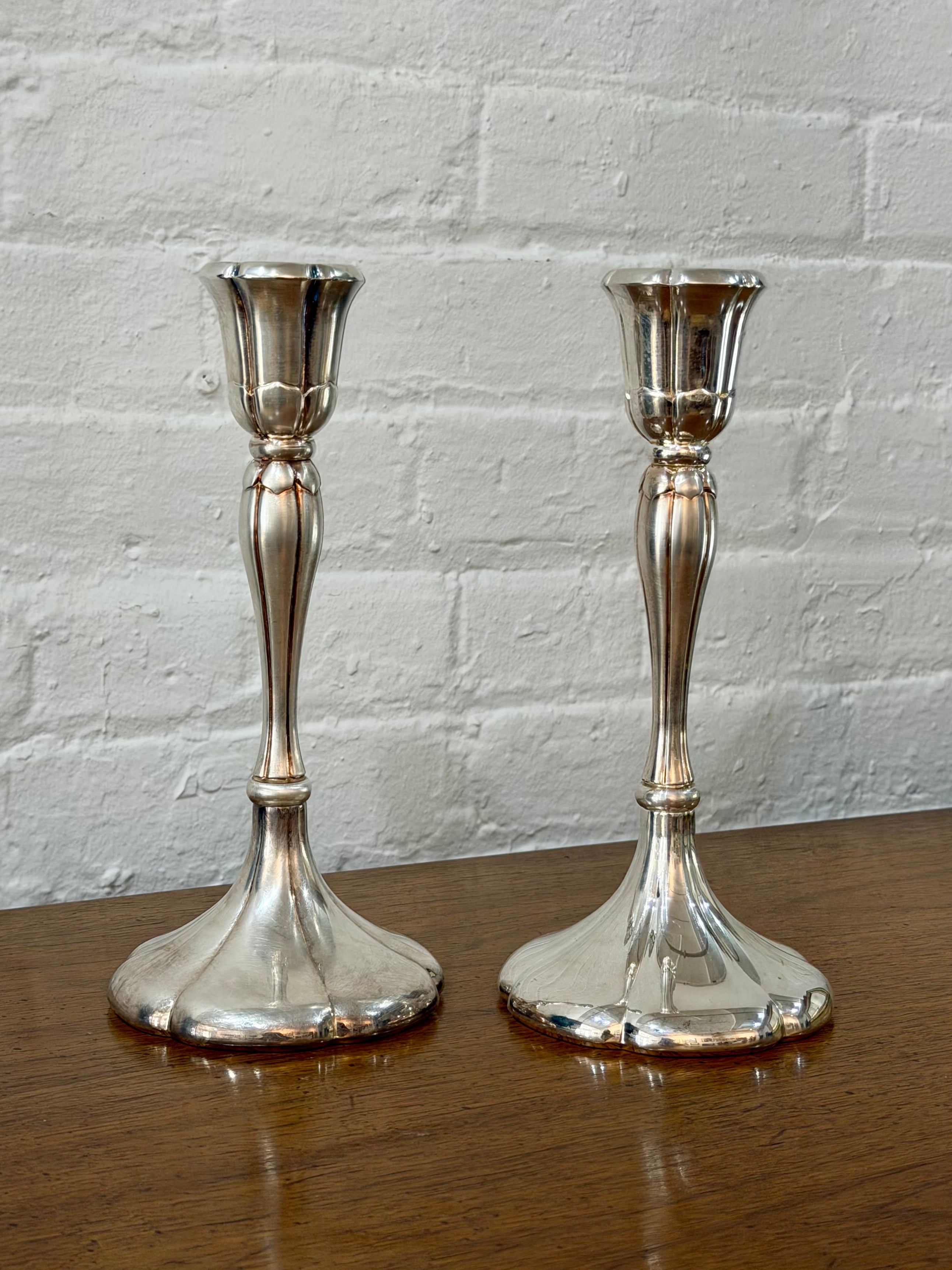 Pair of Weighted Silver Candlestick Holders
