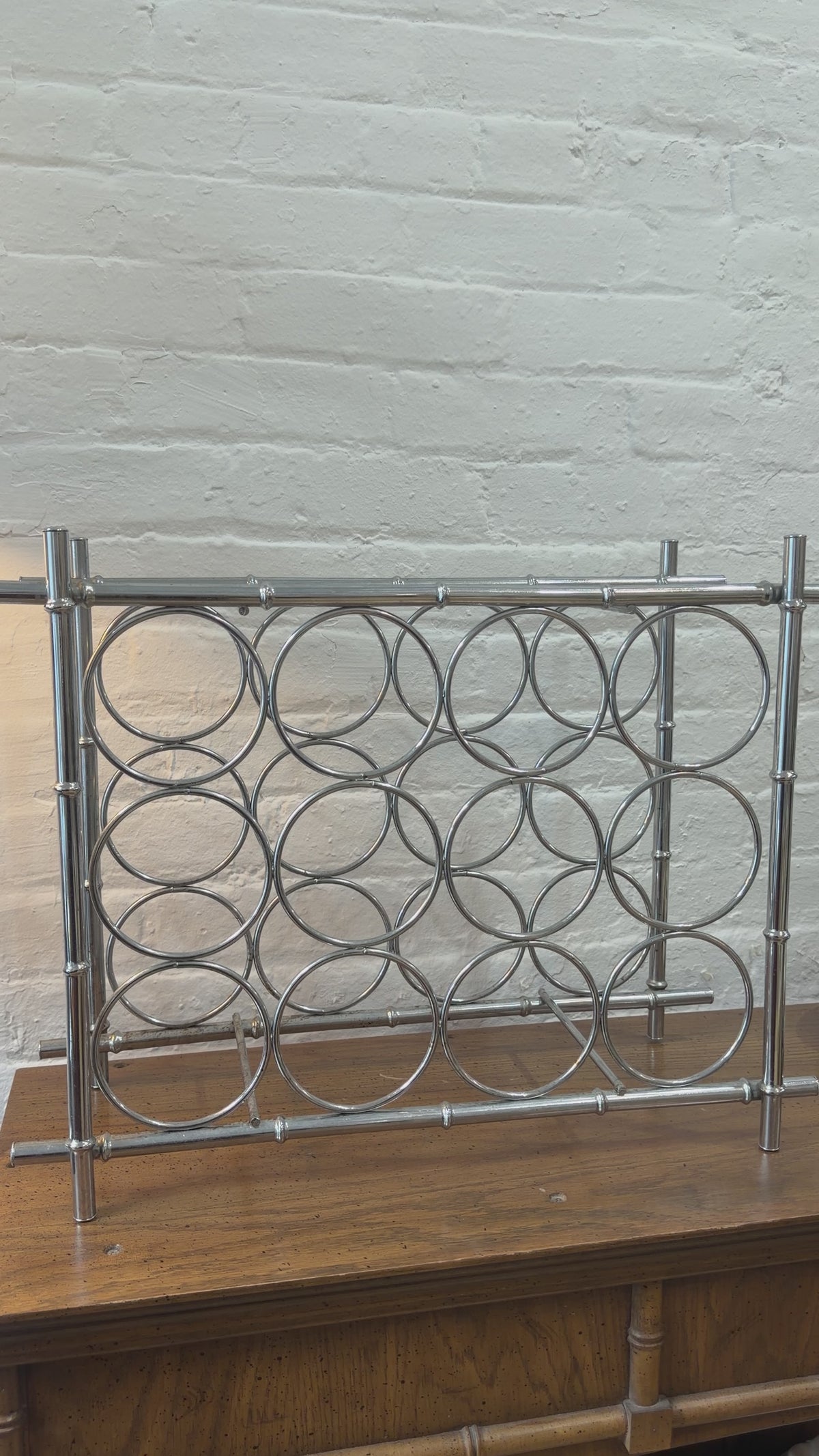 Load video: Chrome Plated Faux Bamboo Metal Wine Rack